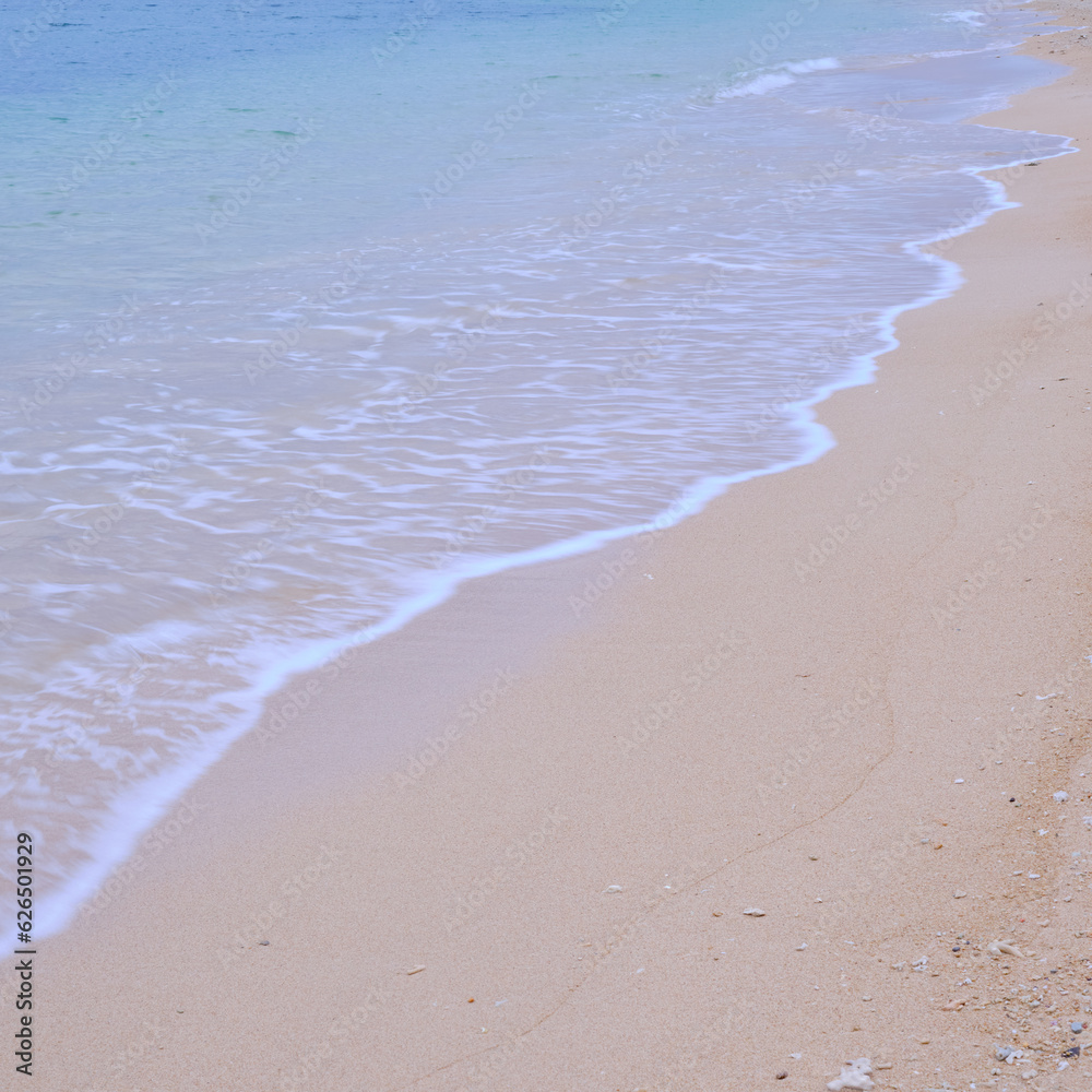 Calm sandy beach and pier in the morning Calm sandy beach and pier in the morning