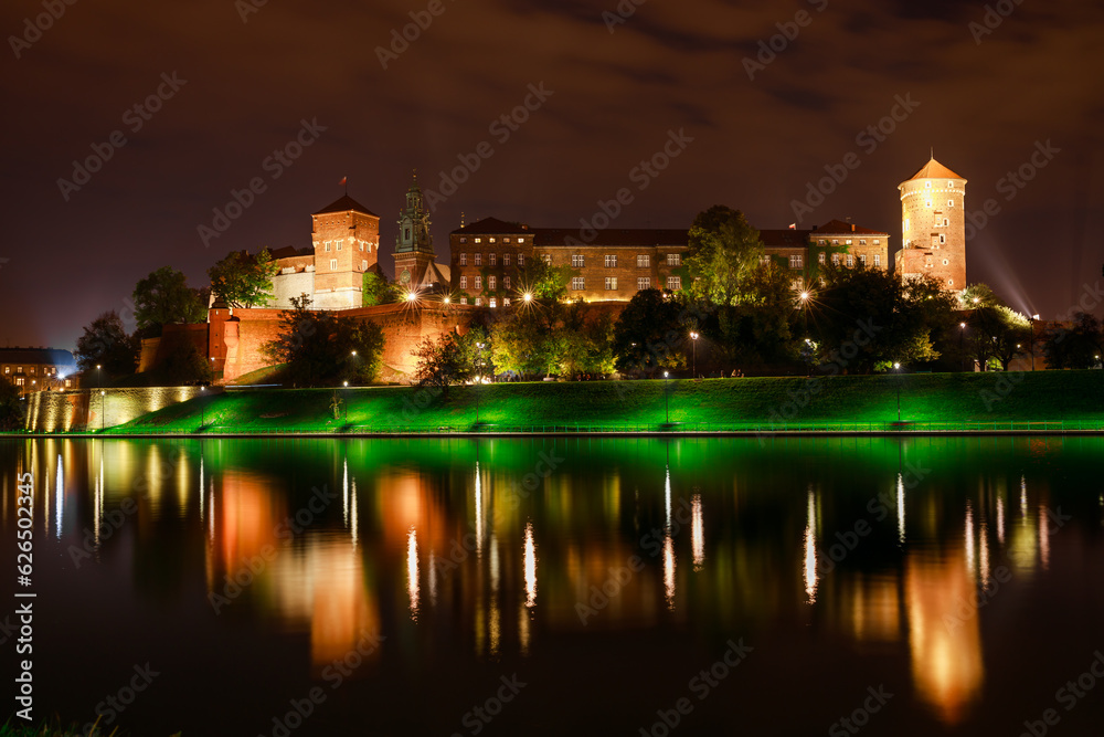 Wawel castle in Krakow, river Wisla, Poland, Europe. Night view