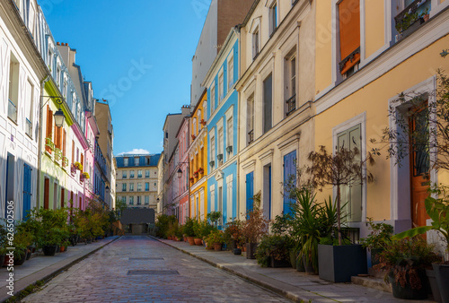 Colorful bright buildings on Cremieux street in Paris, France, Europe