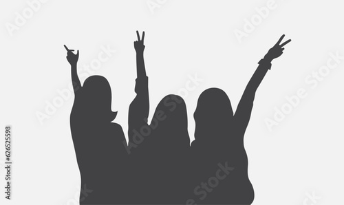Silhouette of a company of happy girls friends.