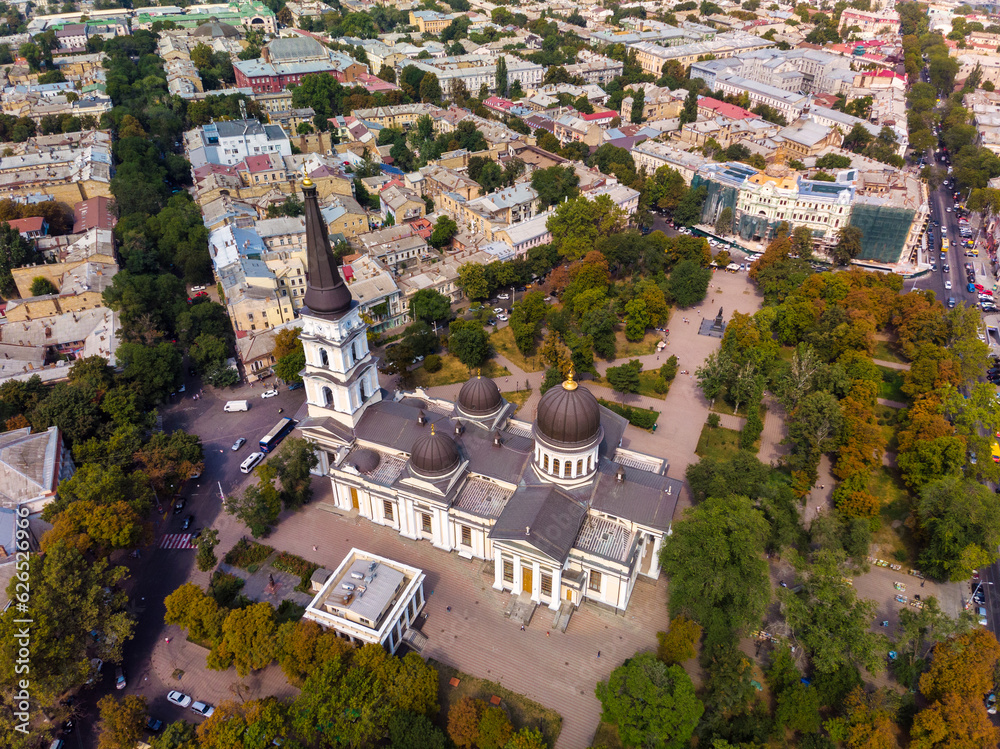 Fototapeta premium View of the Transfiguration Cathedral in Odessa before a Russian missile hit. Beautiful top view of the central cathedral in Odessa. Cathedral before destruction. Top view of Odessa in autumn.