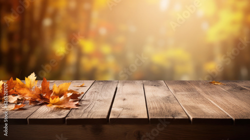 Empty wooden table with autumn background © Piotr Krzeslak