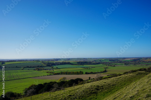 View over green countryside and blue skys © Robert