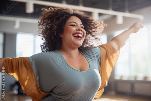 Woman wearing sportwear exercising with confidence at the gym