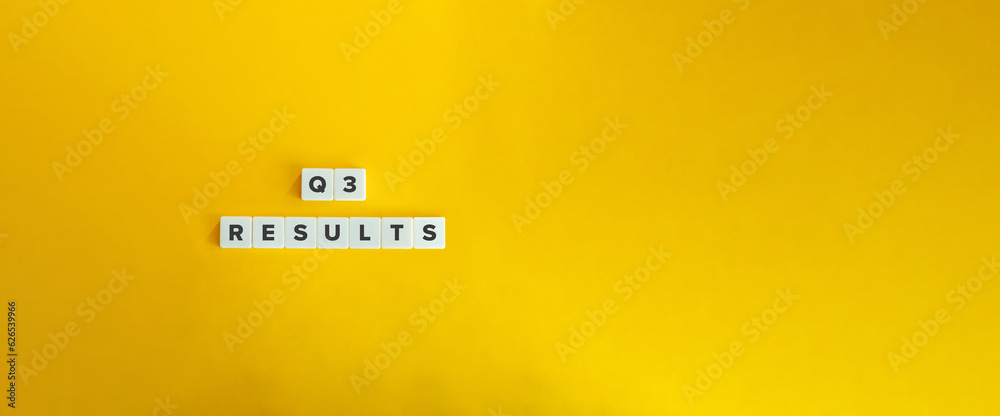 Obraz premium Q3 (third quarter) Business Results. Fiscal Quarters, Company Financial Calendar Concept. Block Letters on Bright Orange Background.