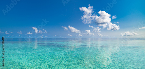 Relaxing seascape with wide horizon of the sky and the sea. Panorama of tropical beach seascape horizon. Abstract bright sunshine sky light tranquil relax summer seascape freedom wide angle