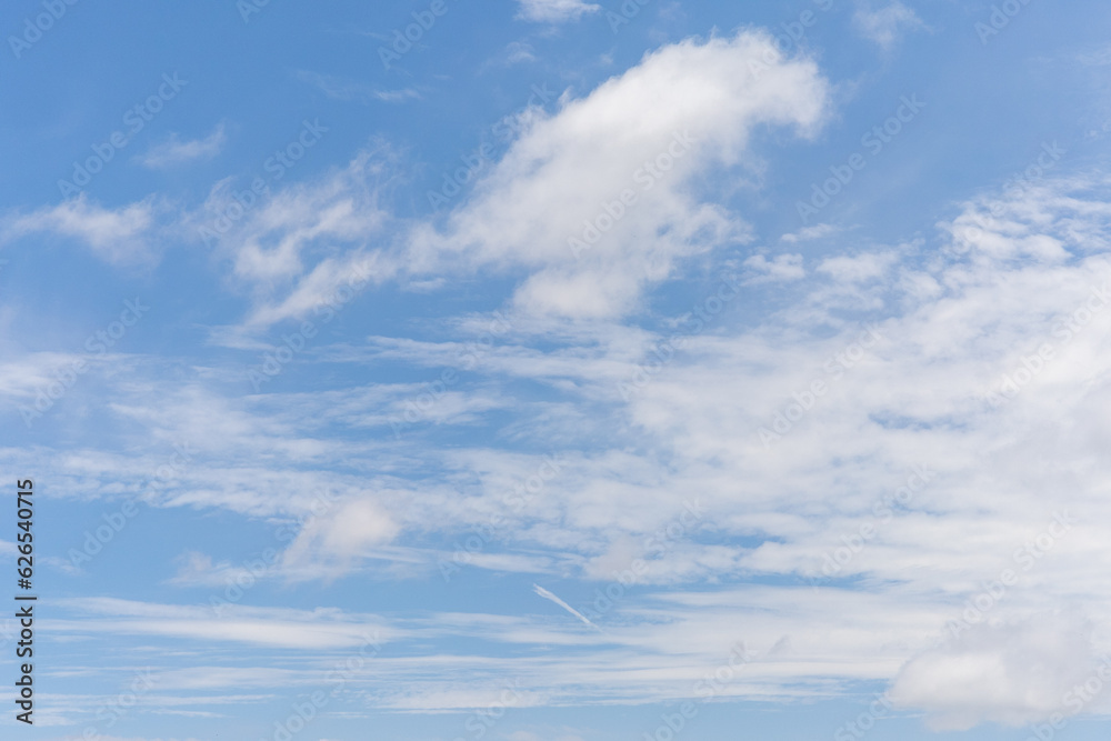 Clear blue sky with white clouds in summer in Thailand.
Clear blue sky with white clouds in summer in Thailand.