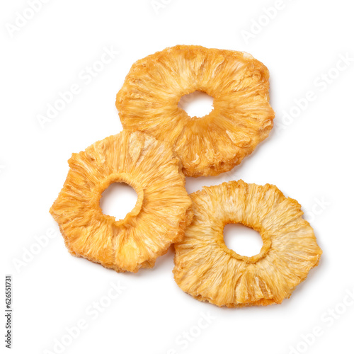 Dried pineapple slices isolated on white background close up