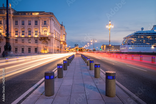 Trieste, Italy at Night, on the left the so called Piazza Unità d'Italia, on the right sight the harbour of Trieste - Long exposure
