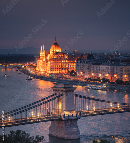 Amazing Chain Bridge with the Parliament in sunset in Budapest  Hungary