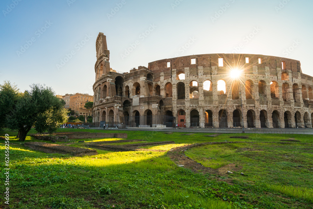 Colosseum panorama at sunrise in Rome, Italy 