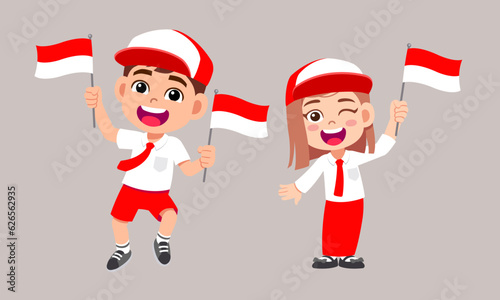 Cute little kids character holding small indonesia flag celebrate independence day