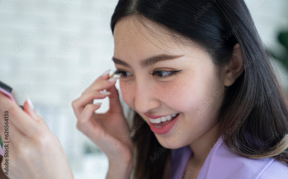 asian beautiful woman make up at bedroom asian beautiful woman make up at bedroom