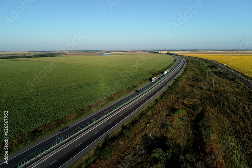 Aerial view at sunrise of A2 Highway motorway road between Bucharest and Constanta cities. Amazing beautiful road. 