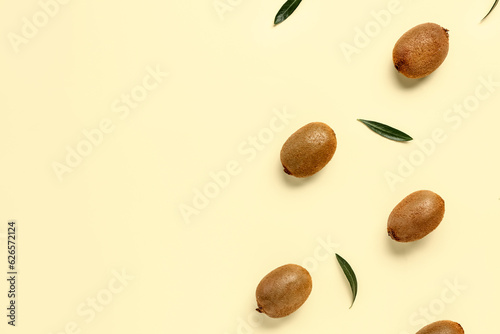 Wallpaper Mural Many fresh kiwi and leaves on yellow background Torontodigital.ca