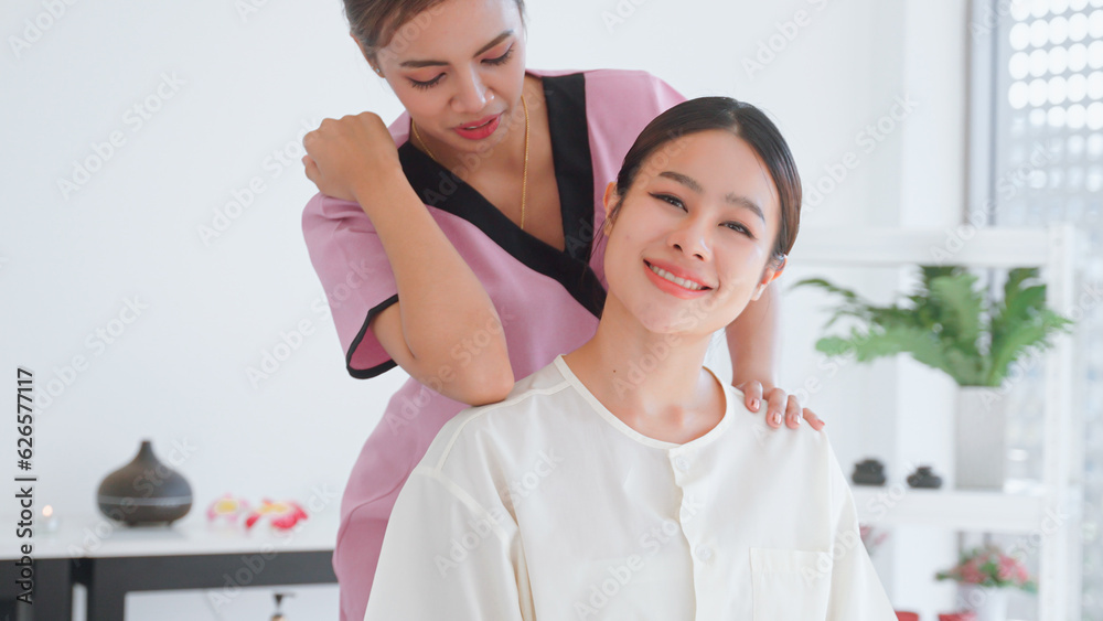 Thai massage for young woman by skilled masseuse. Thai massage for young woman by skilled masseuse.