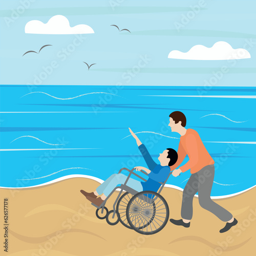 Two people on the sea coast, one of them in a wheelchair, in motion