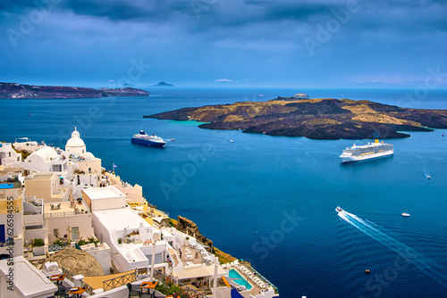 Fototapeta Naklejka Na Ścianę i Meble -  Aerial of Santorini island and towns and cruise ships in bay, Greece 