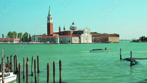 View from Riva degli Schiavoni on San Giorgio Maggiore, basilica in the classical Renaissance style, opposite the Piazzetta di San Marco in Venice, Italy. photo