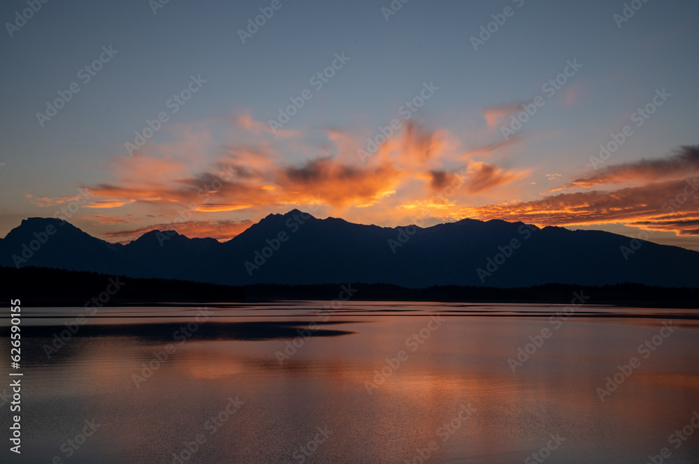 Sunset Paints The Sky And Jackson Lake Below