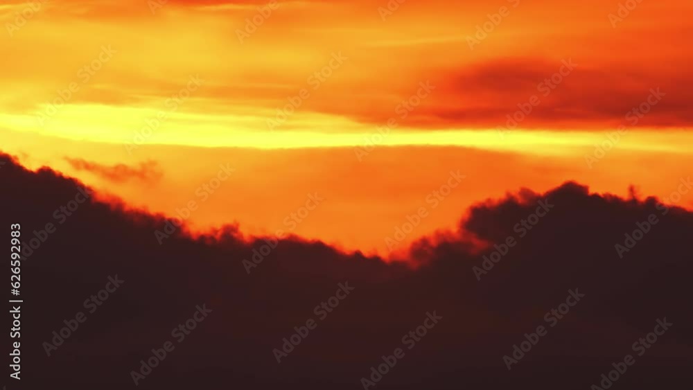 Sunset in the orange yellow red sky timelapse. Epic big bright sun set clouds in the evening. Vibrant color background time Lapse. Cinematic rainy summer sky. Sunset in the orange yellow red sky timelapse. Epic big bright sun set clouds in the evening. Vibrant color background time Lapse. Cinematic rainy summer sky.