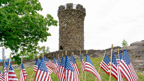 Castle Craig at Hubbard Park, Meriden, CT. American flags in the foreground and an easily replaceable sky.
