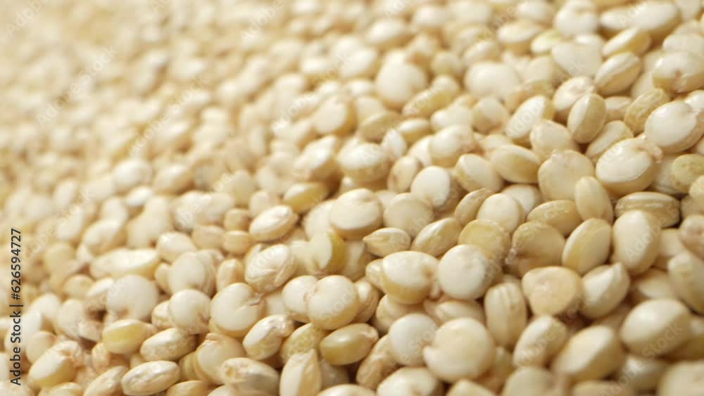 Quinoa itself is often referred to as a pseudo-cereal because it is cooked and used in a similar manner to grains, but botanically, it is a seed. Macro video. Food concept. White Quinoa background
Quinoa itself is often referred to as a pseudo-cereal because it is cooked and used in a similar manner to grains, but botanically, it is a seed. Macro video. Food concept. White Quinoa background