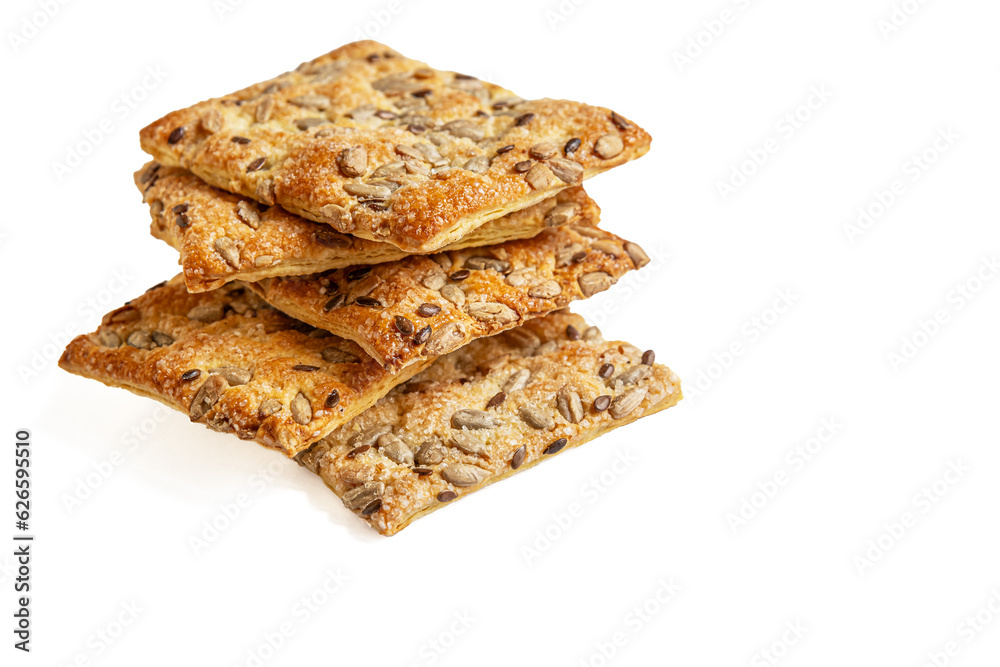 sweet crispy biscuits with sunflower and flax seeds isolated on white