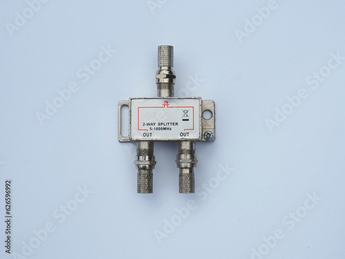 Digital 2-way coaxial cable splitter. Splitter for distributing the signal to two loads. Multi purpose 2-way coax cable splitter photo