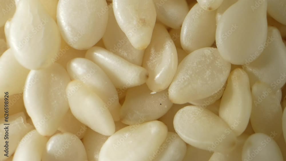 White sesame seeds are commonly used as a garnish and ingredient in various dishes. They are sprinkled on top of bread, buns, and other baked goods to add texture and enhance the visual appeal.
White sesame seeds are commonly used as a garnish and ingredient in various dishes. They are sprinkled on top of bread, buns, and other baked goods to add texture and enhance the visual appeal.