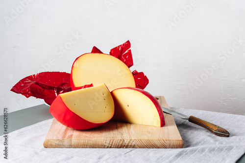 Sliced head of Edam cheese.