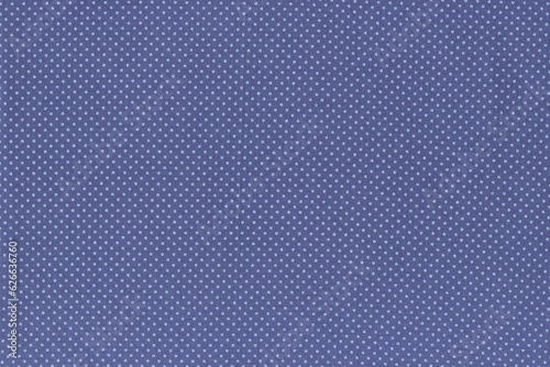 Texture of soft natural cotton fabric of blue color with small polka dots. A soft napkin with blue dots. A simple background of ordinary natural fabric.