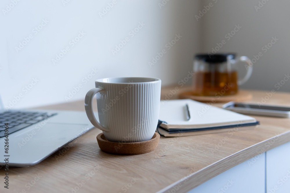 coffee and laptop with notebook close up coffee and laptop with notebook close up