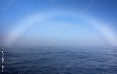 A fogbow over Arctic Ocean near North Cape in Northern Norway on late summer day in August 2022.