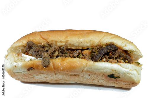 Chicken and Beef meat shawarma sandwiches,  popular Middle Eastern dish that originated in Ottoman Empire, meat, chicken cuts to thin slices roasted slowly with spices and chili, colorful bell pepper photo