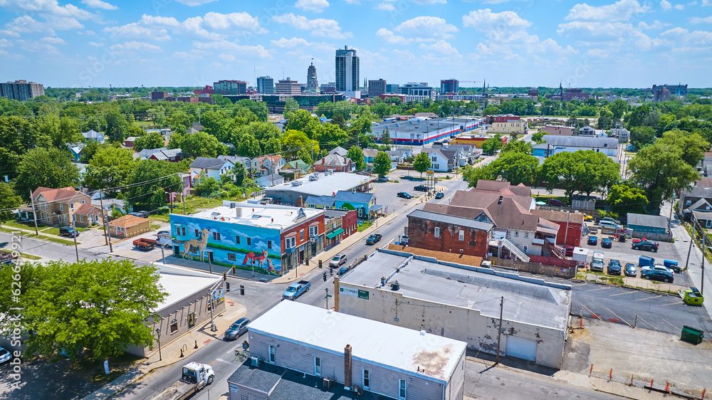 Aerial near downtown Fort Wayne with distant skyscrapers and Wells Street fox and wolf mural Aerial near downtown Fort Wayne with distant skyscrapers and Wells Street fox and wolf mural