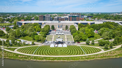 Aerial COSI with manicured green lawn of Lower Scioto Greenway with river