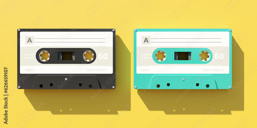 Fototapeta premium Two vintage audio cassette tapes with blank label isolated on yellow color background,