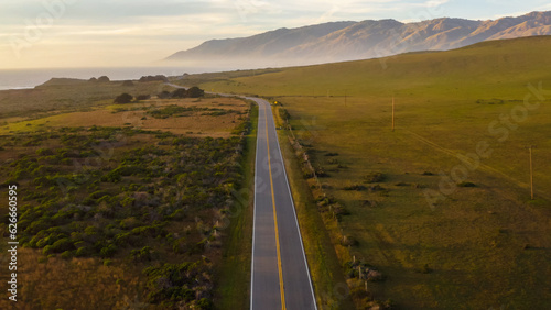 Beautiful highway transportation road scene. California Raodtrip. Highway 1 Aerial panorama at sunset. Muir Woods, San Francisco. Aerial top down view of the road. 