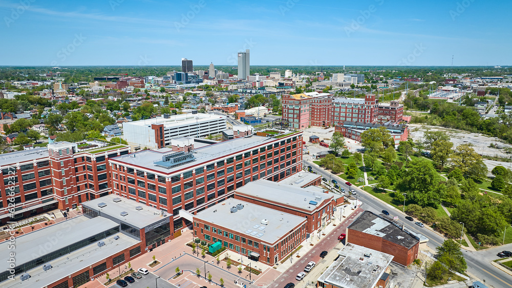 Old General Electric Works factory building refurbished near park in downtown Fort Wayne aerial
