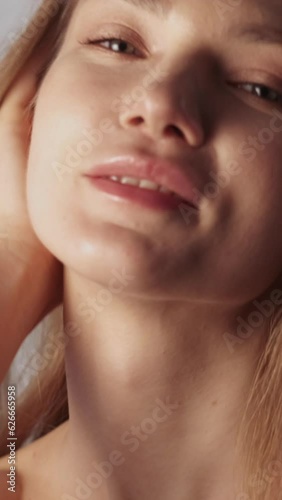 Wallpaper Mural Vertical video. Skincare wellness. Beauty model. Cosmetics care. Gorgeous happy confident young woman with fresh glowing radiant face enjoying perfect skin. Torontodigital.ca
