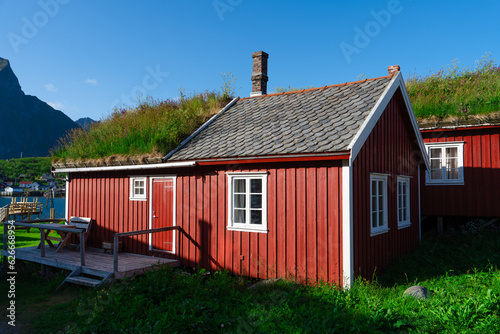 Norway. Fishermans red rorbu cottage in the Lofoten Islands. Typical Scandinavian Fishermans house. now days popular tourist apartments, cottages, rent houses.