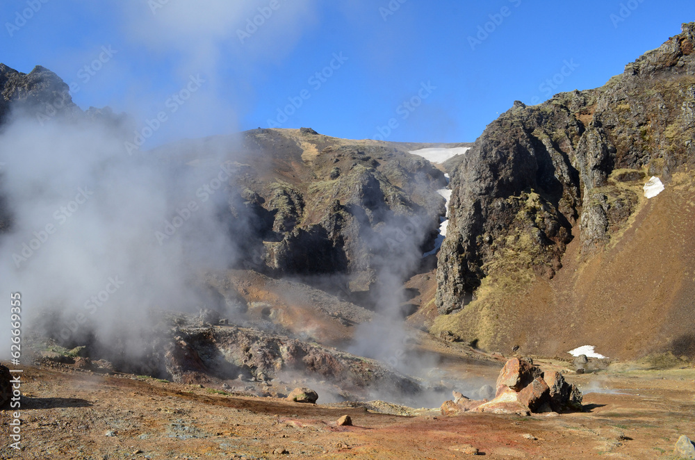 Fototapeta premium Geothermal Steam Vapors Rising from Hveragerdi Iceland