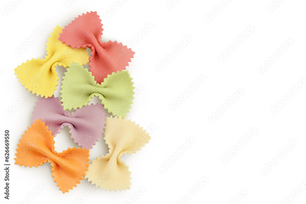 colorful farfalle pasta isolated on white background . Top view with copy space for your text. Flat lay. colorful farfalle pasta isolated on white background . Top view with copy space for your text. Flat lay.
