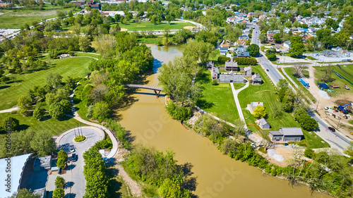 St. Marys River near old fort at Fort Wayne Headwaters Park aerial with construction and houses
