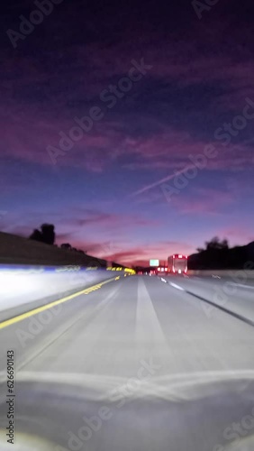 Dawn driving time lapse vertical view of the San Bernardino Interstate 10 Freeway near Palm Springs in Southern California.