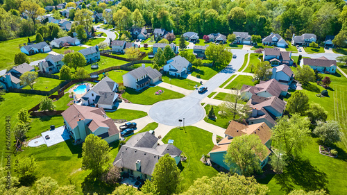 Photos Summertime fresh cut green lawns landscaping in yards of suburban neighborhood