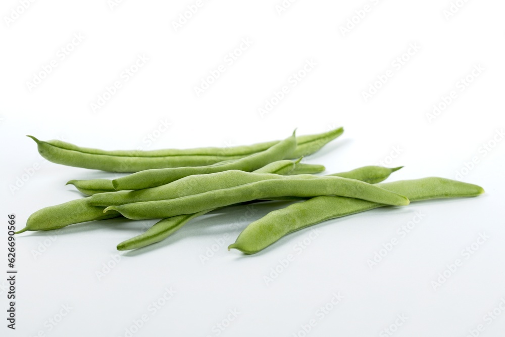 Studio photo of a pile of fresh green beans. Studio photo of a pile of fresh green beans.