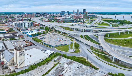 Criss crossing roads near quarry, shipping yard, and skatepark outside Louisville panorama aerial
