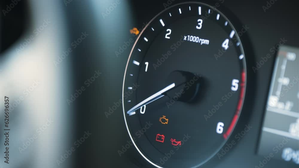 When Car Engine Starts, All Warning Signs Appeal, Unrecognizable Driver Preparing to Drive. Begins to Travel on the Road. All of the Alert Signals Blinking for One Time to Check If They Work or Not.